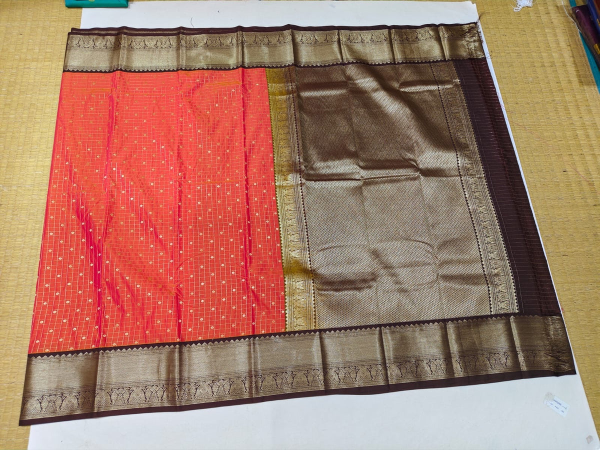 Coral orange and brown gold border festive saree detail