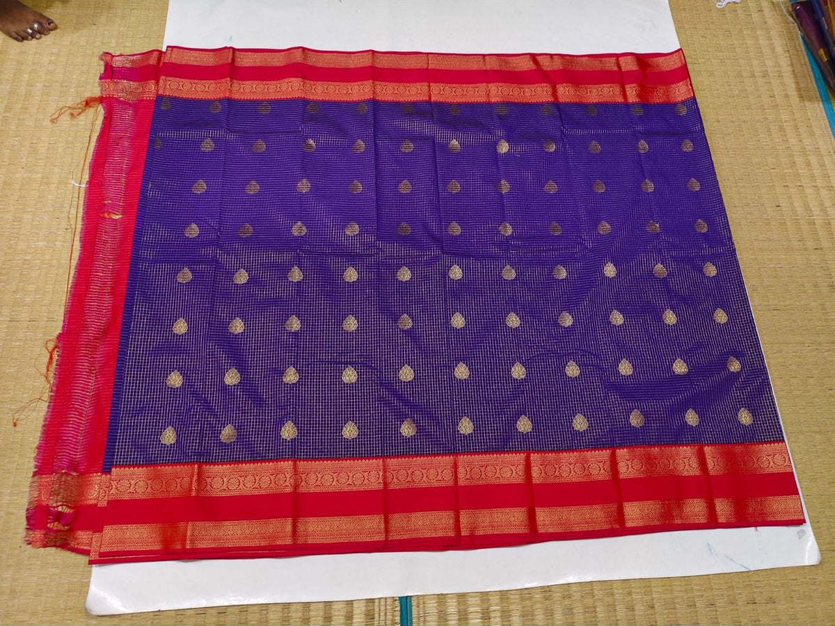 Full view of royal blue and pink gold motif semi-silk festive saree