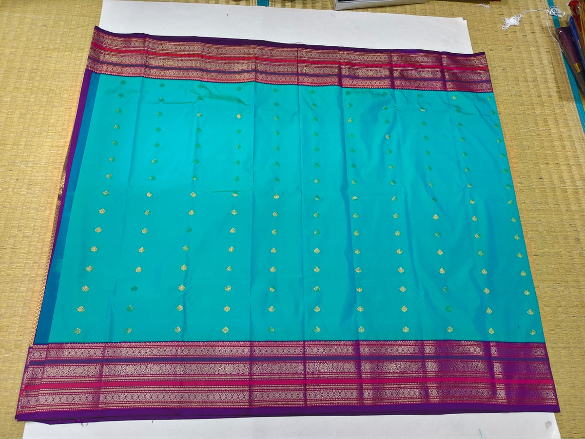 Aqua blue and purple gold border festive saree