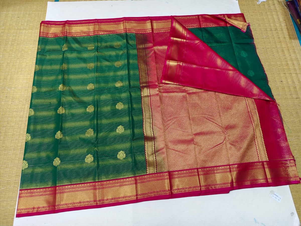 Bottle green and pink gold border festive saree detail