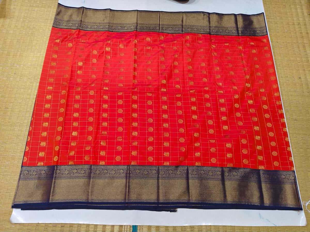 Full view of coral red and navy blue semi-silk festive saree