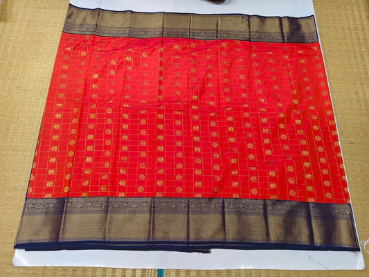 Full view of coral red and navy blue semi-silk festive saree
