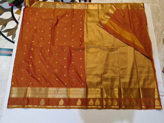 Rust Orange and Gold semi silk saree
