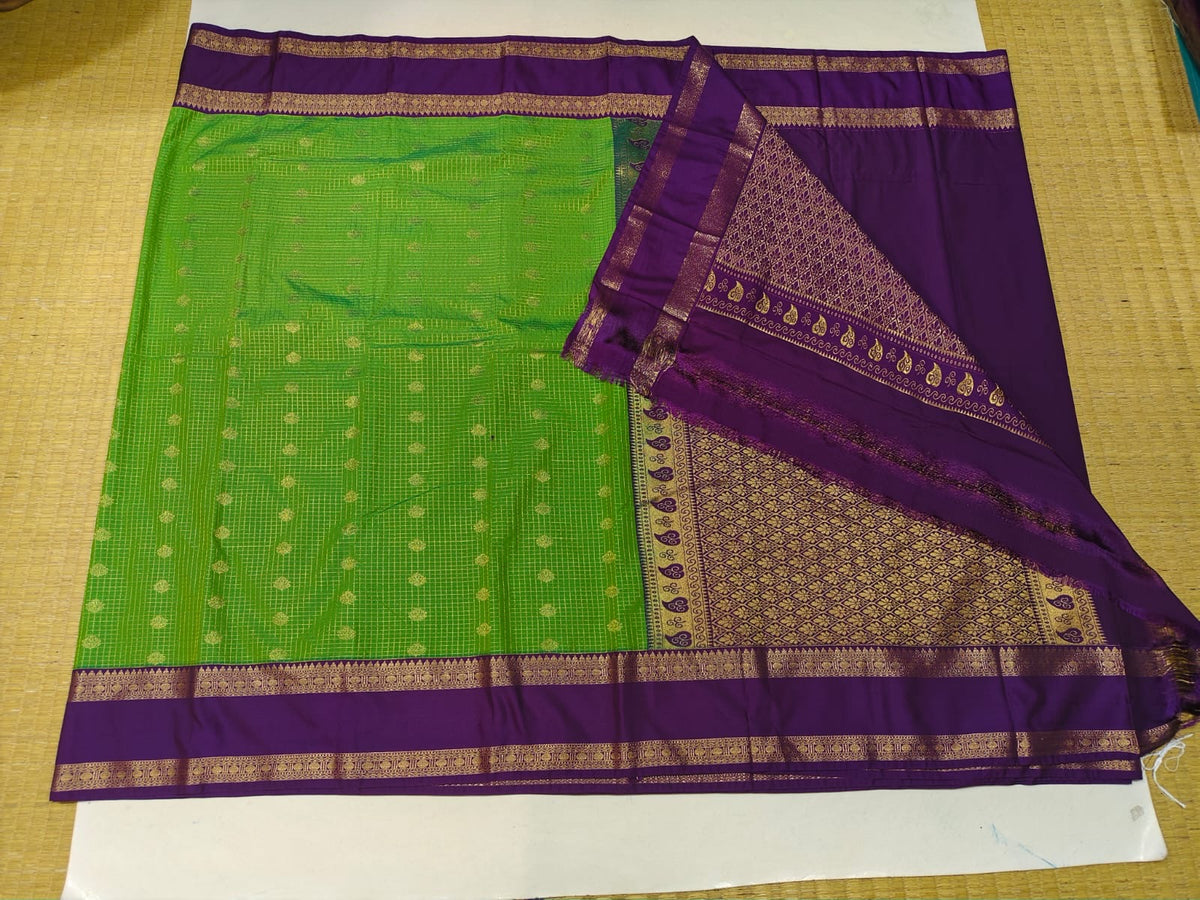 Lime green and purple semi-silk festive saree with gold motifs and pallu