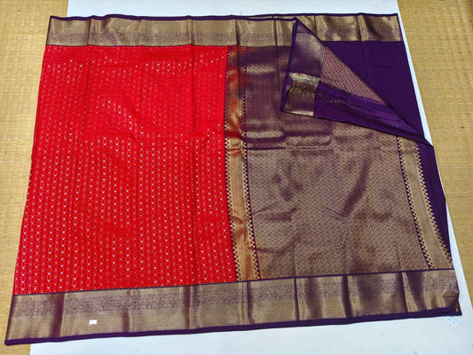 Red and purple Ikat-style semi-silk festive saree with gold border and pallu
